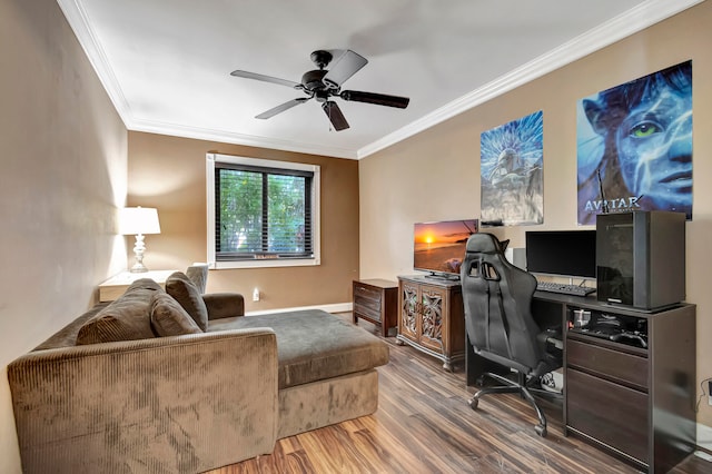 home office with hardwood / wood-style flooring, crown molding, and ceiling fan