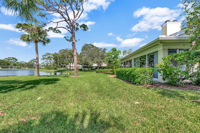 view of yard featuring a water view