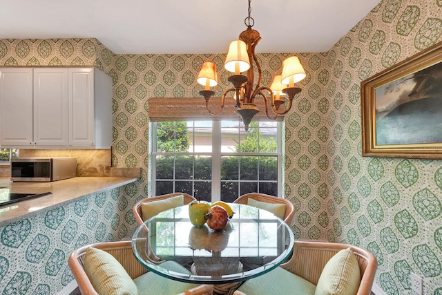 dining area with a chandelier