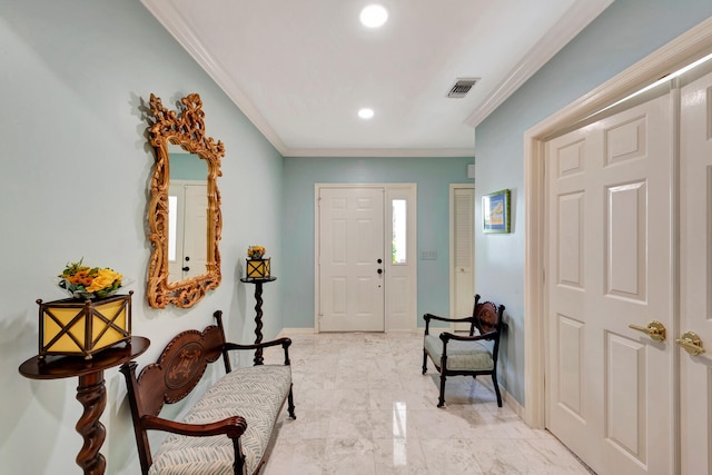 foyer entrance with ornamental molding