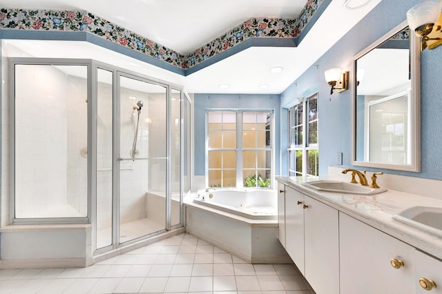 bathroom featuring vanity, tile patterned floors, and separate shower and tub