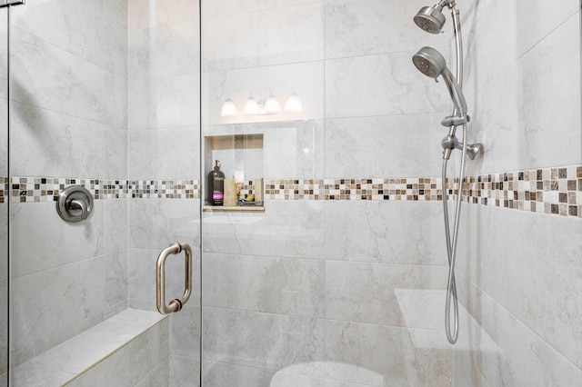 bathroom featuring an enclosed shower