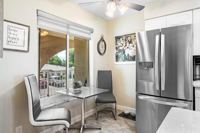 dining room with ceiling fan