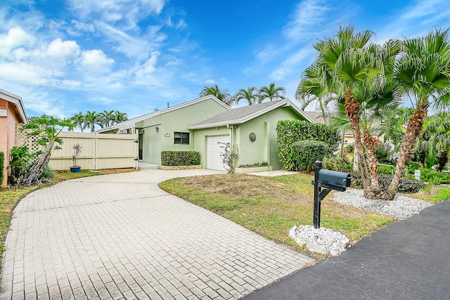 view of front of home featuring a garage