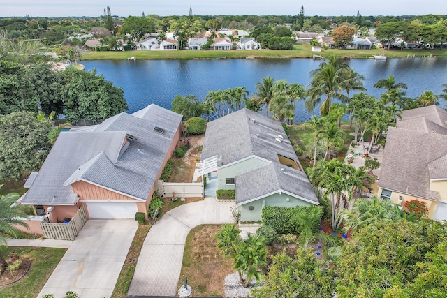 aerial view featuring a residential view and a water view