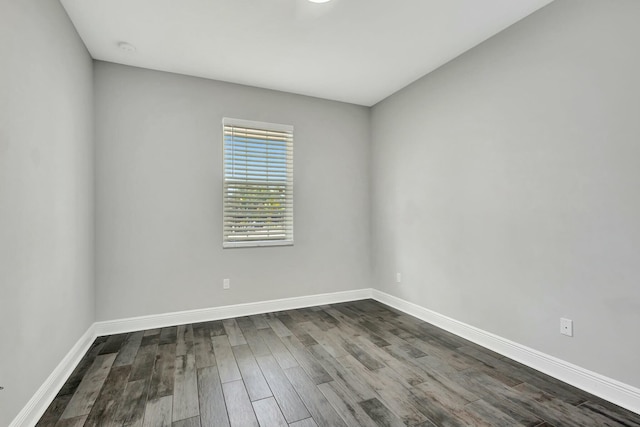 spare room with wood-type flooring