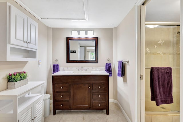 bathroom with vanity, toilet, tile patterned flooring, and a shower with door