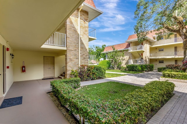 exterior space with a lawn