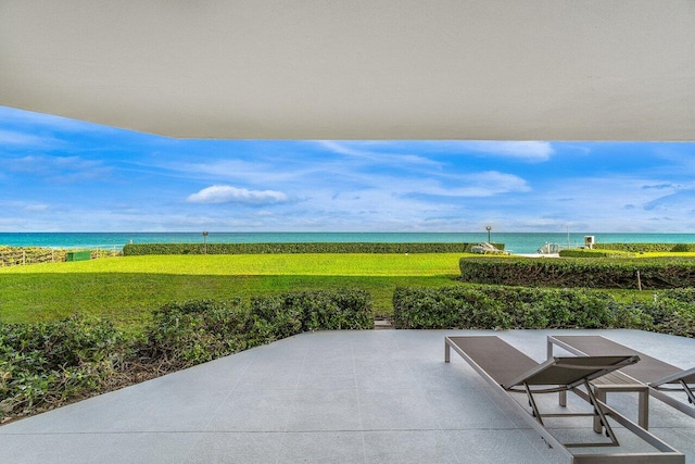 view of patio featuring a water view