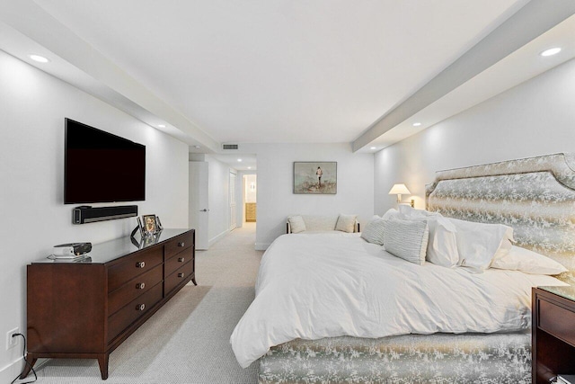 bedroom with light colored carpet