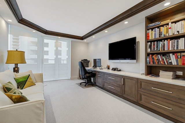 office area with light carpet and built in desk