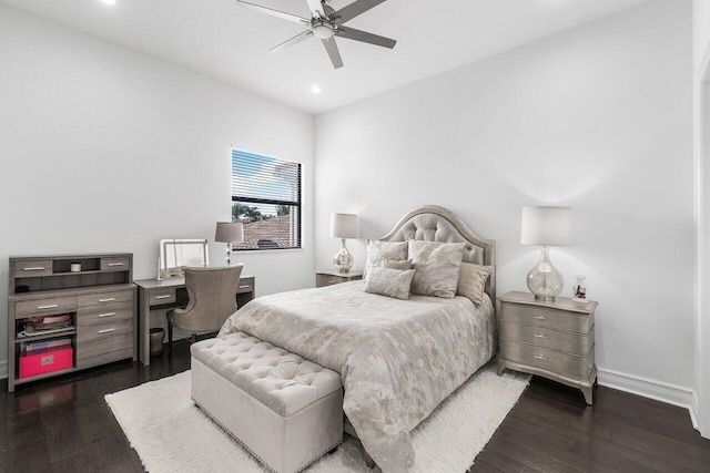 bedroom with ceiling fan and dark hardwood / wood-style flooring