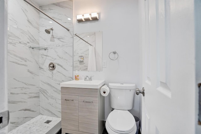 bathroom featuring vanity, toilet, and a shower with curtain