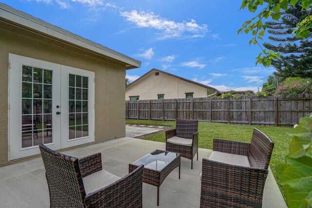 view of patio / terrace featuring french doors and outdoor lounge area