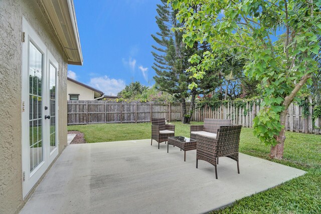 single story home with a front yard and a garage