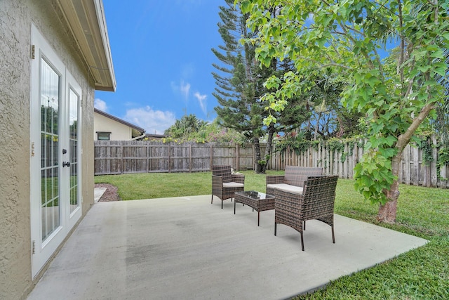 view of patio / terrace with an outdoor hangout area and french doors