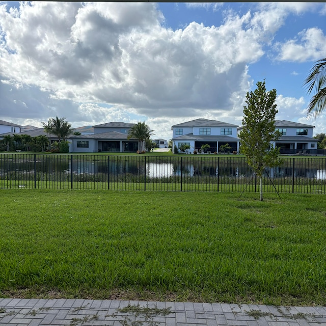 view of yard with a water view