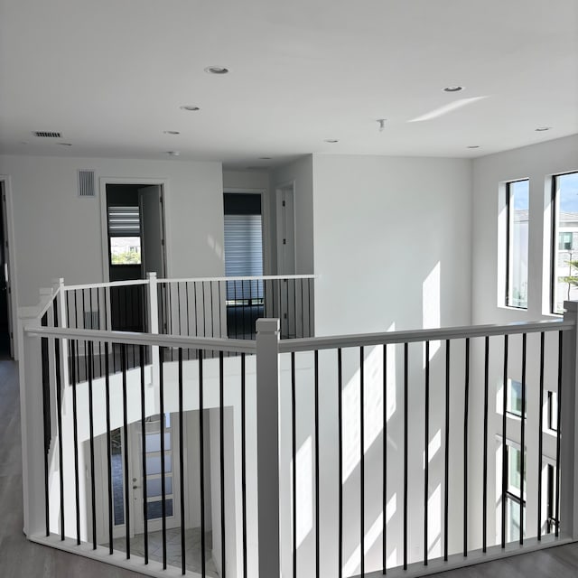 corridor featuring hardwood / wood-style flooring