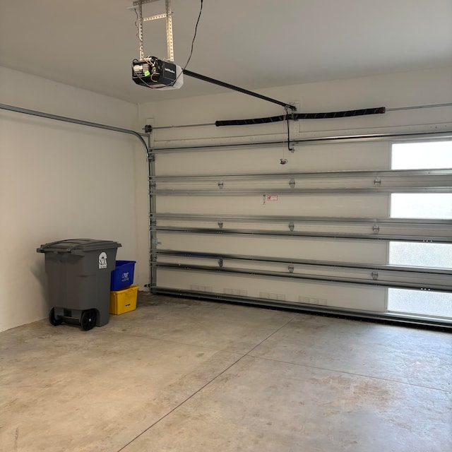 garage featuring a garage door opener