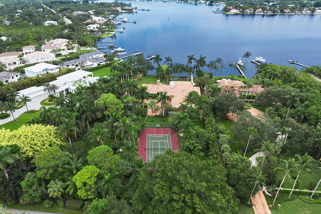 birds eye view of property featuring a water view