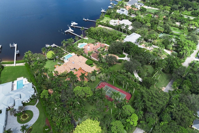 birds eye view of property with a water view