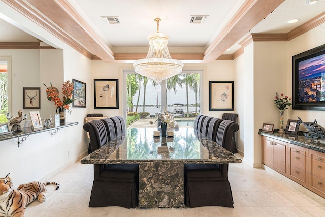 dining room featuring a raised ceiling, crown molding, and a notable chandelier