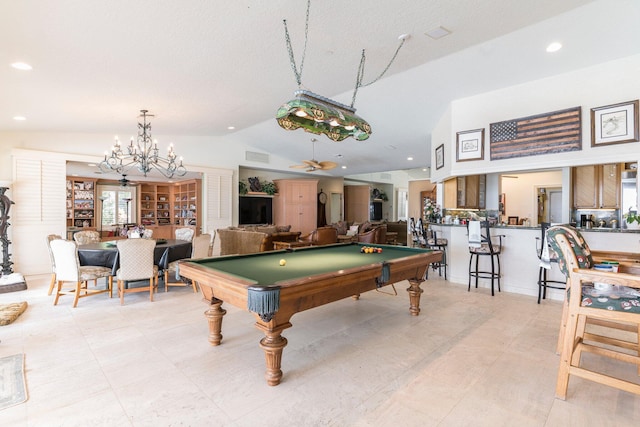 rec room featuring ceiling fan with notable chandelier, vaulted ceiling, and pool table