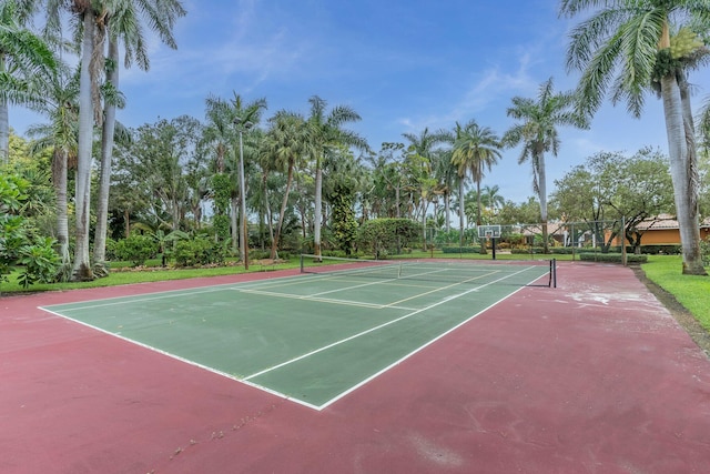 view of tennis court featuring basketball court