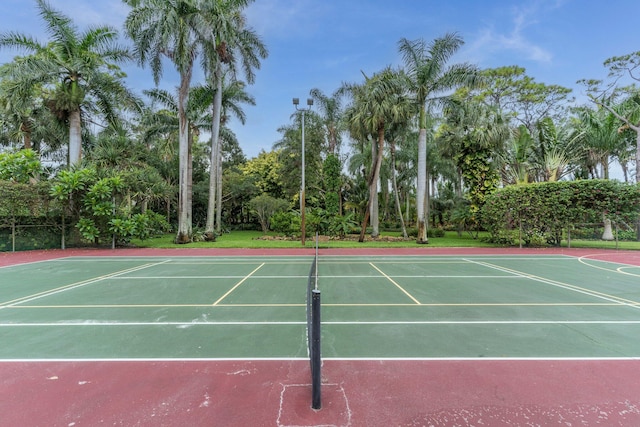 view of sport court featuring basketball hoop