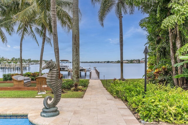 dock area featuring a water view