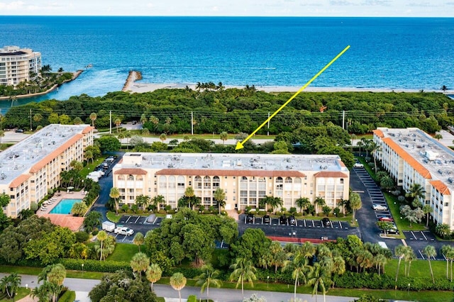 birds eye view of property featuring a water view