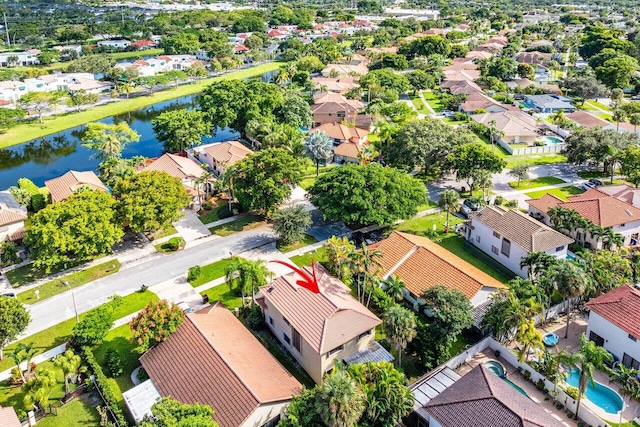 drone / aerial view with a water view