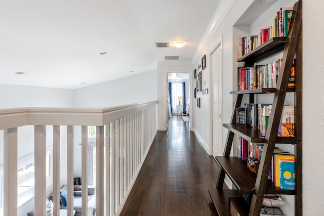 corridor featuring dark hardwood / wood-style flooring