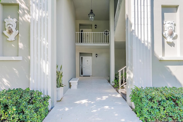 entrance to property with a balcony