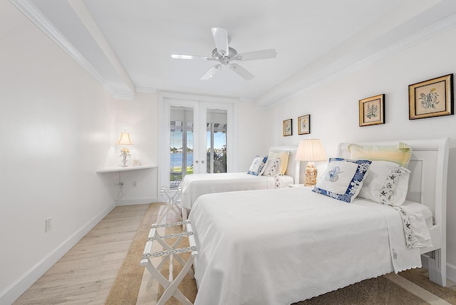 bedroom with french doors, light wood-type flooring, ornamental molding, ceiling fan, and access to exterior