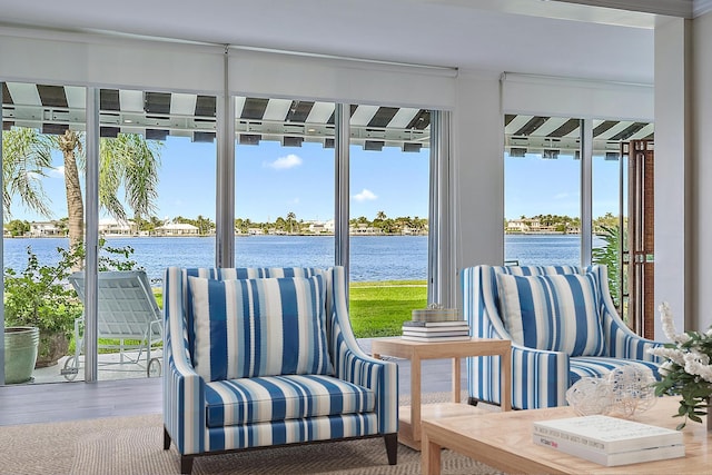 sunroom with a water view