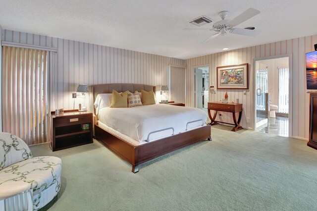 carpeted bedroom featuring access to outside and ceiling fan