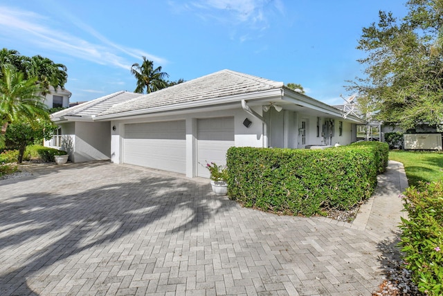 view of front of property featuring a garage