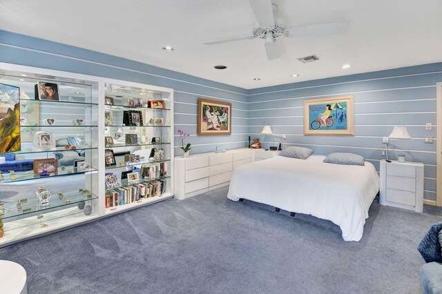 spacious closet featuring dark colored carpet