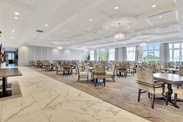 dining area with a wealth of natural light and coffered ceiling