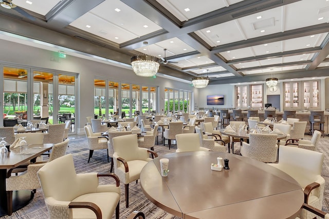 dining area with a towering ceiling, plenty of natural light, beam ceiling, and coffered ceiling