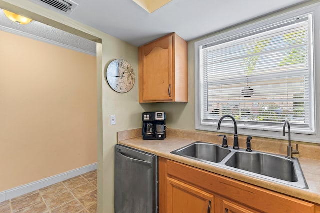 2950 SE Ocean Blvd Unit 38-2, Stuart, FL 34996 - kitchen featuring stainless steel dishwasher, a sink, visible vents, light countertops, and baseboards