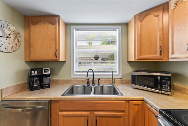 kitchen with stainless steel appliances and sink