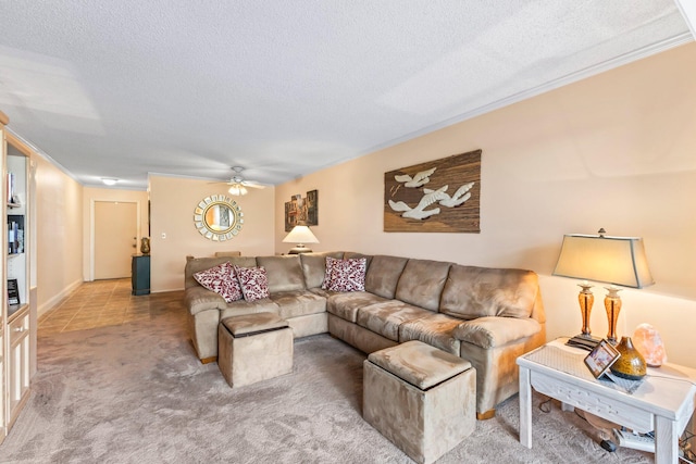 living room featuring light carpet, crown molding, a textured ceiling, and ceiling fan