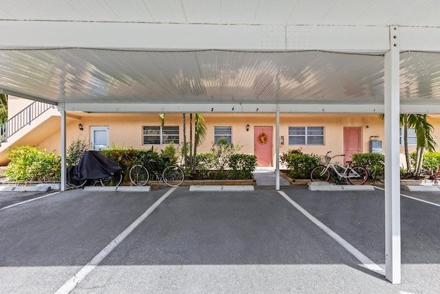 exterior space with a carport