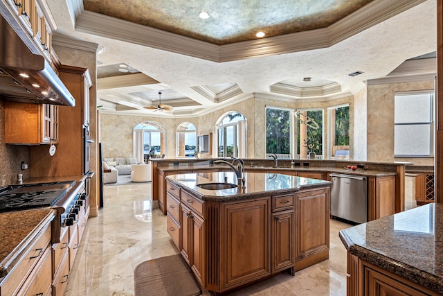 kitchen with sink, dishwasher, an island with sink, coffered ceiling, and crown molding