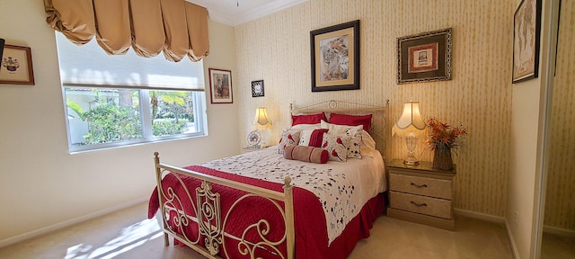 carpeted bedroom featuring ornamental molding