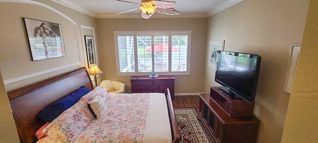 bedroom featuring wood-type flooring, ceiling fan, and crown molding