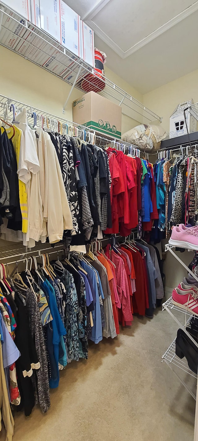 clothes washing area featuring cabinets, light tile patterned floors, a textured ceiling, and washer and clothes dryer