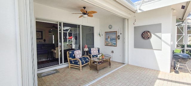 view of patio / terrace featuring ceiling fan